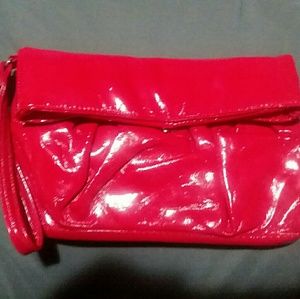 NWOT bright red Clutch,big wallet or acessories bag. Perfect cond. Reduced s&h